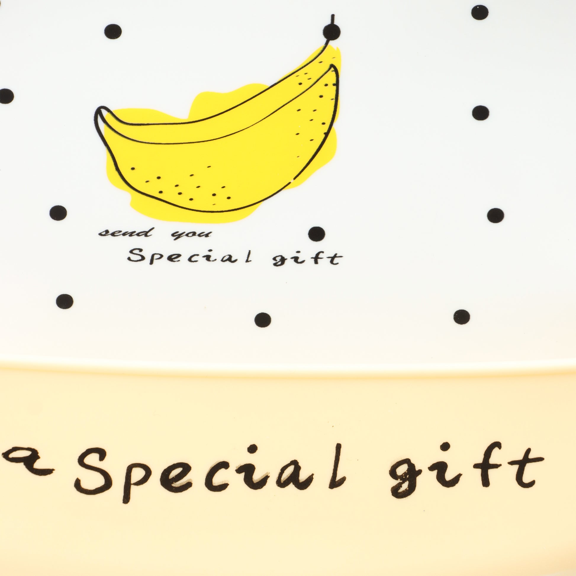 Baby Silicone Feeding Bib with Food Catcher Pocket – White & Yellow Banana Print