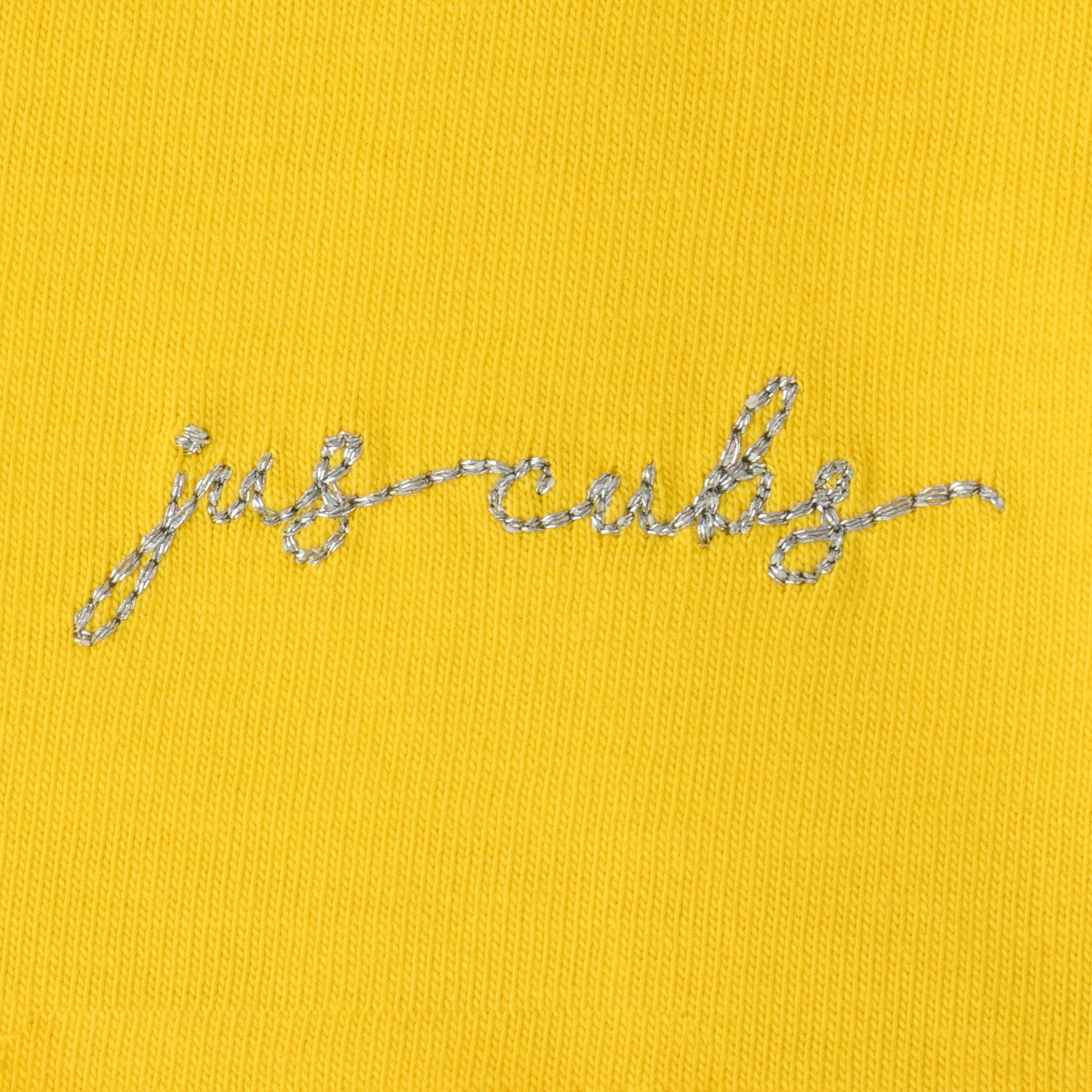"Girls' Yellow Solid Polo T-Shirt with Ruffled Button Placket , White Collar & Embroidered Logo"