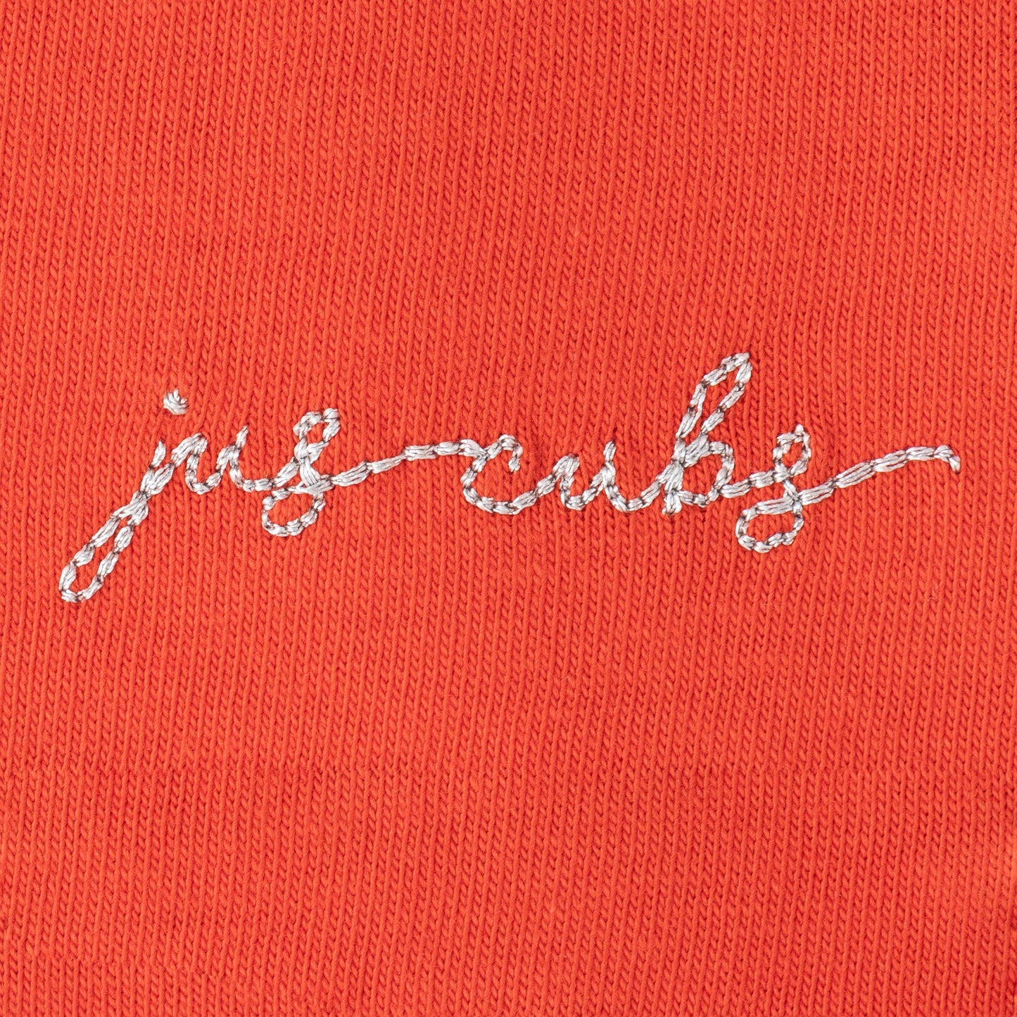 "Girls' Orange Solid Polo T-Shirt with Ruffled Button Placket , White Collar & Embroidered Logo"