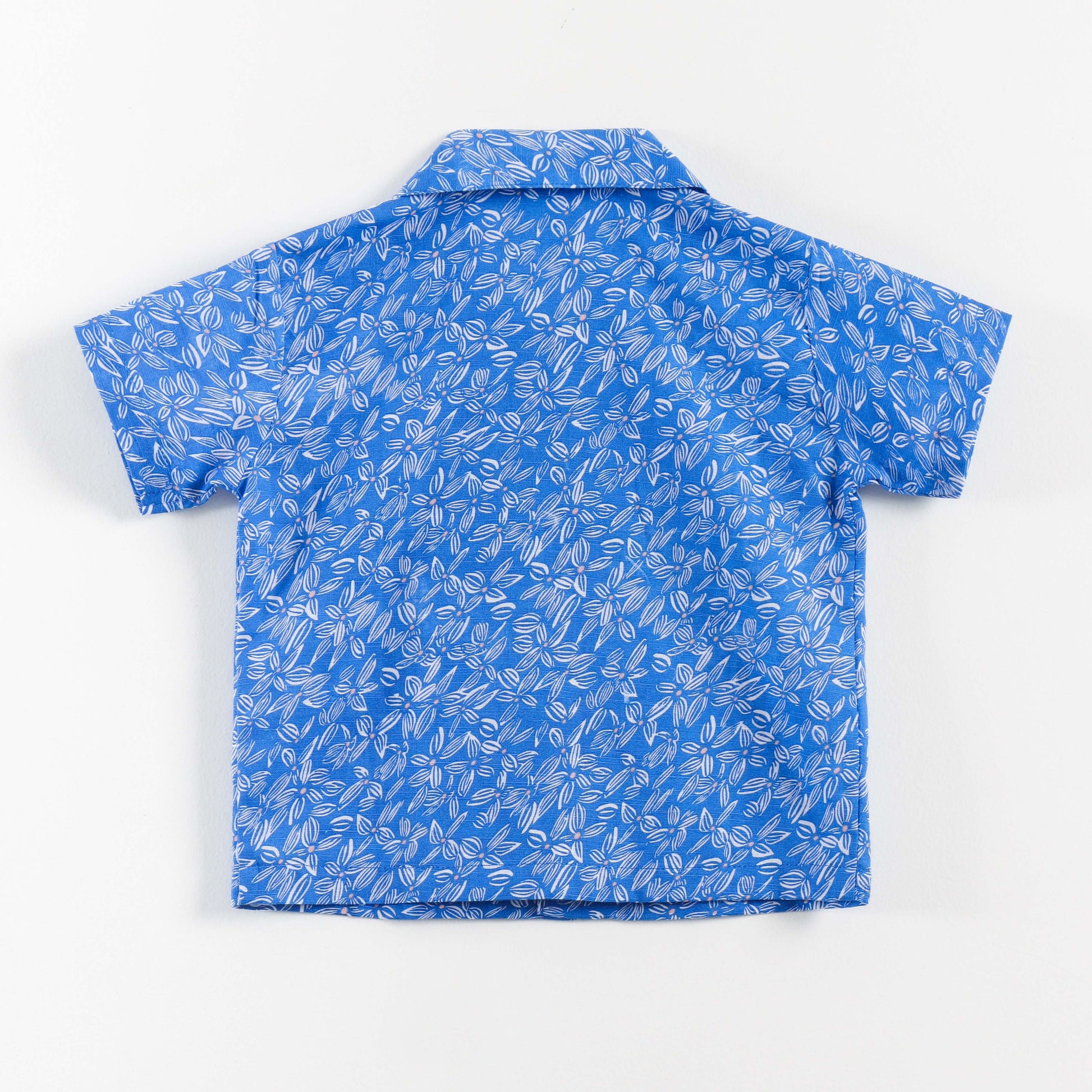 "Boys Blue Cotton Shirt with Allover Leaf Print – Half Sleeve Casual Wear"