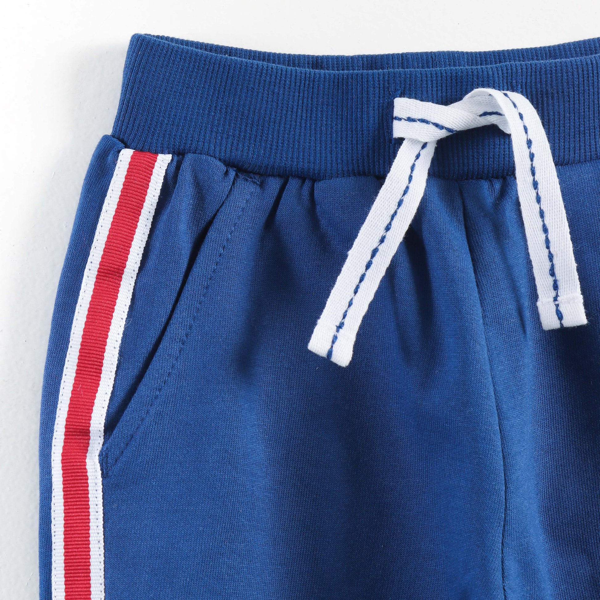 "Baby Boys Comfortable Cotton Royal Blue Joggers with Red & White Stripes"