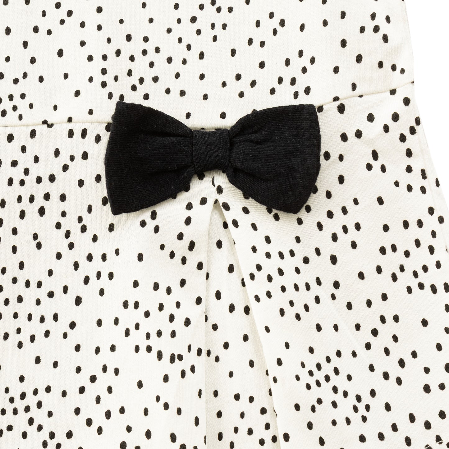 "Girls' Polka Dot Top with Ruffle Sleeves and Black Bow Accents – White & Black"