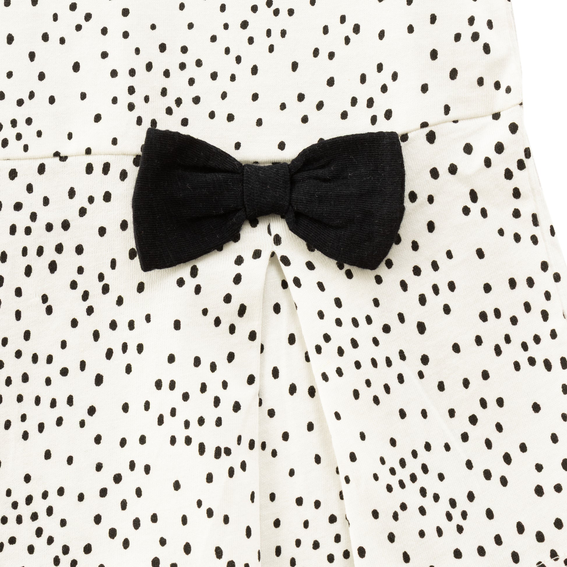 "Girls' Polka Dot Top with Ruffle Sleeves and Black Bow Accents – White & Black"