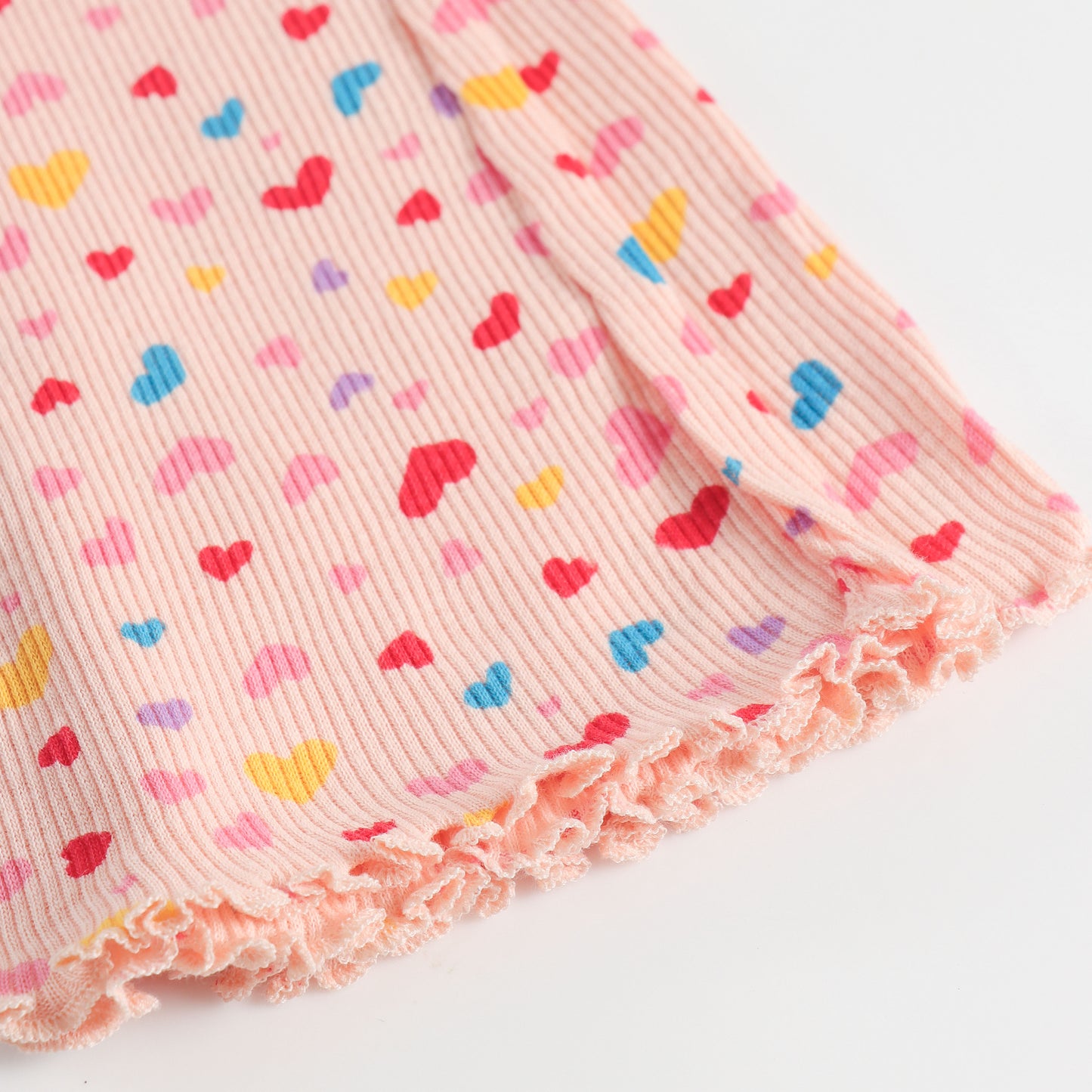 "Girls Pink Ribbed Cotton Leggings with All-Over Multicolor Heart Print"