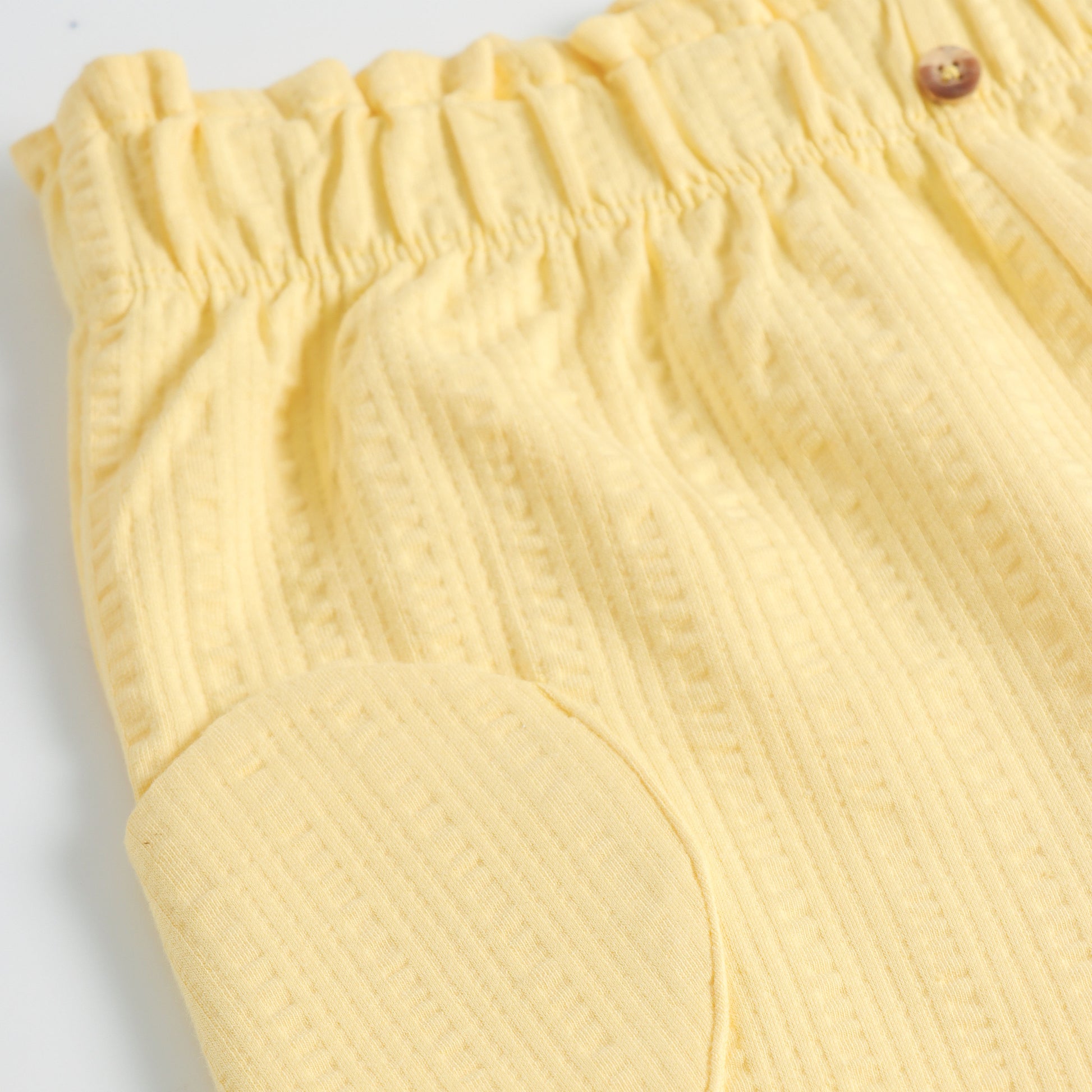 "Girls Yellow Casual Shorts with Stylish Texture, Stretch Waistband & Functional Pocket Design"