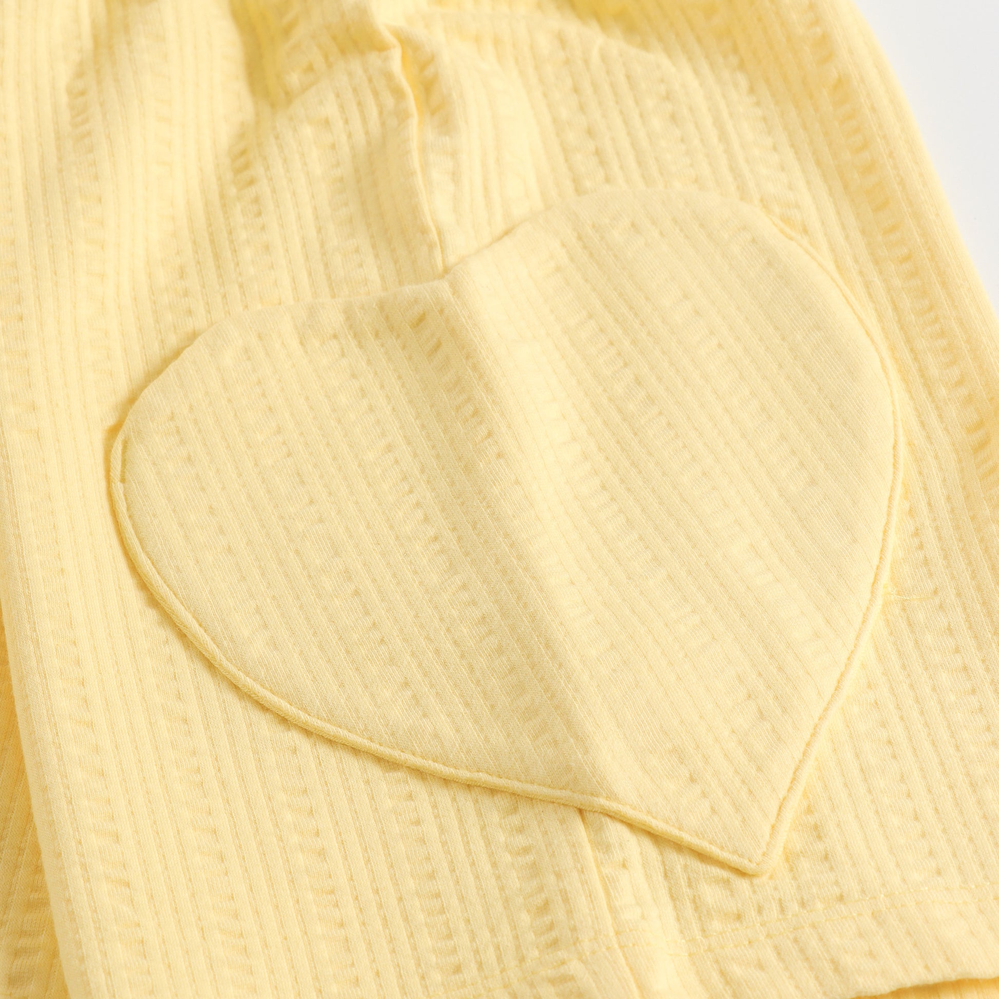 "Girls Yellow Casual Shorts with Stylish Texture, Stretch Waistband & Functional Pocket Design"