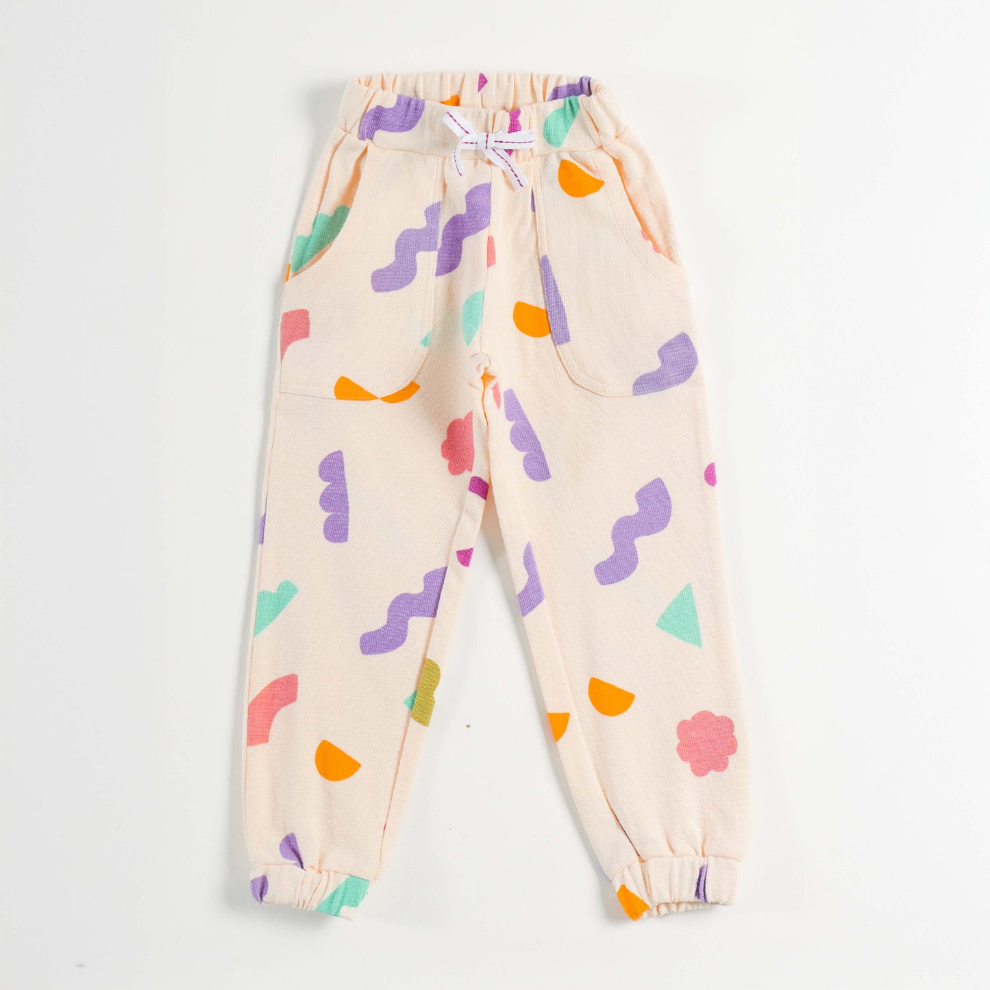 "Girls Multicolor Abstract Print Cotton Jogger Pants with Elastic Waist & Pockets – Soft & Comfortable Daily Wear"