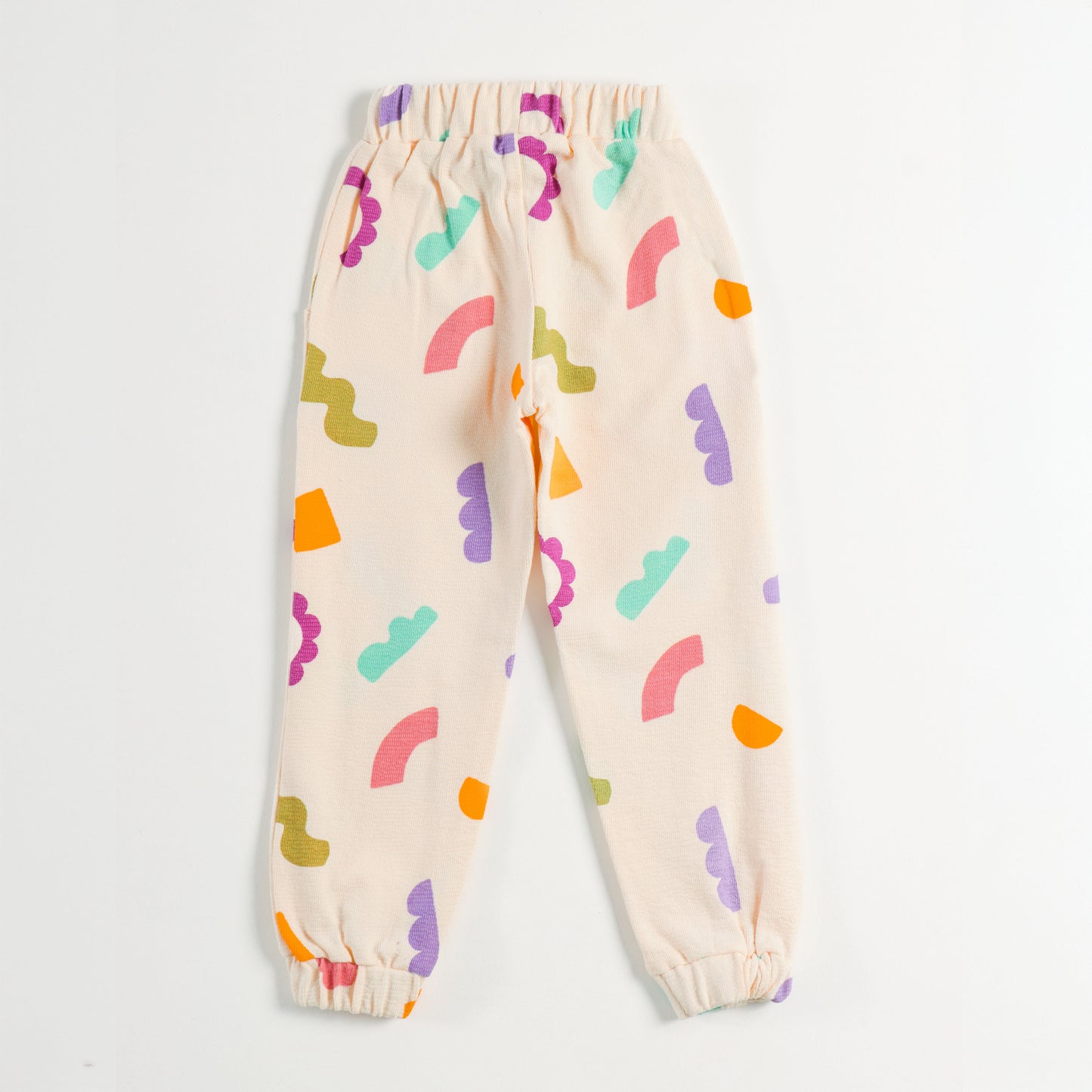 "Girls Multicolor Abstract Print Cotton Jogger Pants with Elastic Waist & Pockets – Soft & Comfortable Daily Wear"