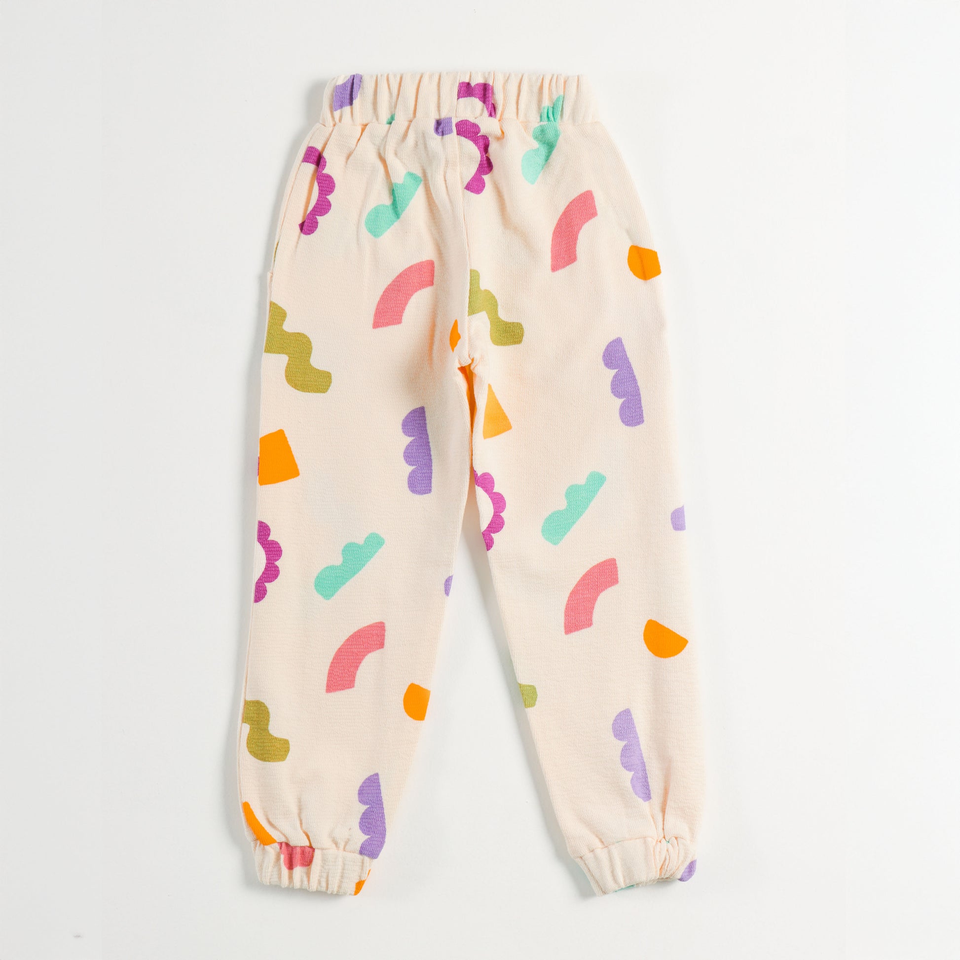 "Girls Multicolor Abstract Print Cotton Jogger Pants with Elastic Waist & Pockets – Soft & Comfortable Daily Wear"