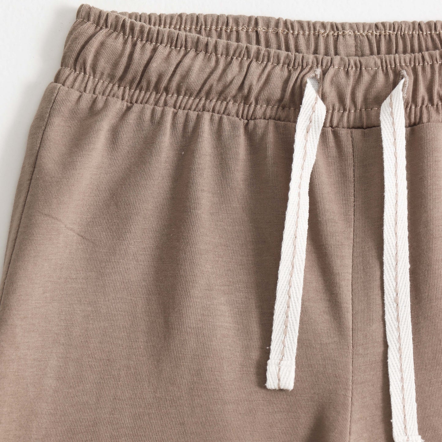 Boys Beige Solid Cotton Knit Drawstring Regular Fit Shorts with Patch Detail