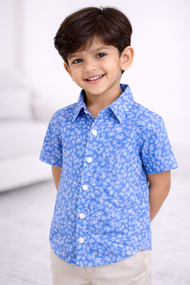 "Boys Blue Cotton Shirt with Allover Leaf Print – Half Sleeve Casual Wear"