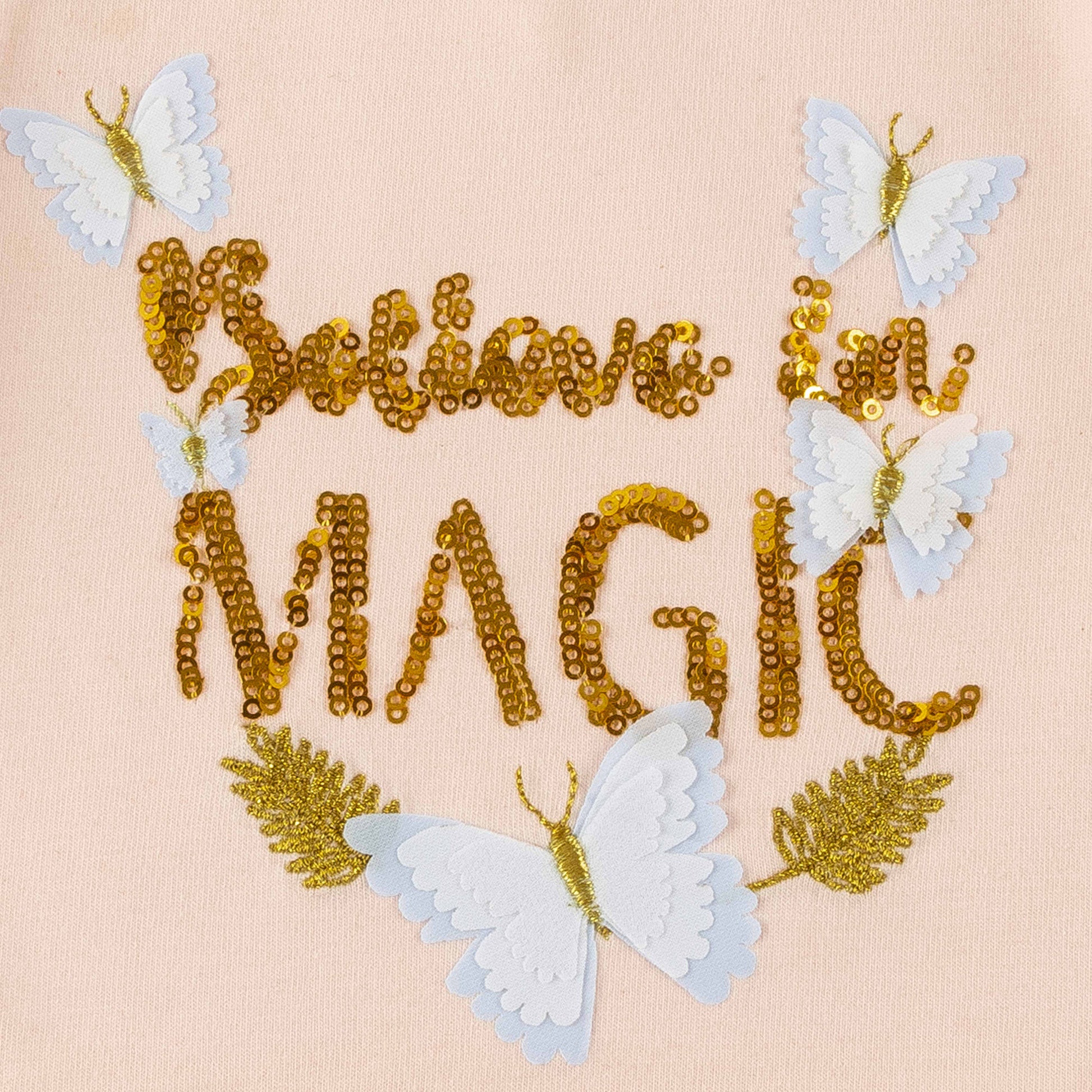 "Girls' Ruffle Hem Top with Butterfly Print & 'Believe in Magic' Glitter Text"